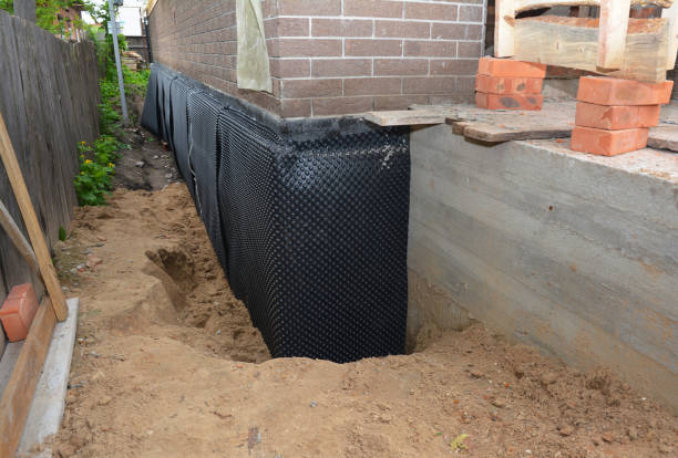 Happy homeowners after waterproofing job in Libertytown
